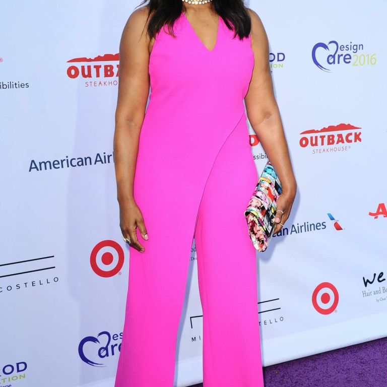 Splurge: Garcelle Beauvais’s Hollyrod Foundation Designcare Gala Trina Turk Fuchsia Solita Jumpsuit