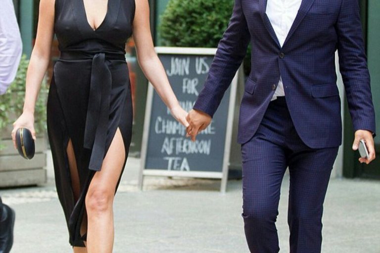 Hot! Or Hmm…: Chrissy Teigen’s Aquazzura ‘Wild Russian’ Mink Fur-Trimmed Pom Pom Sandals in Prune