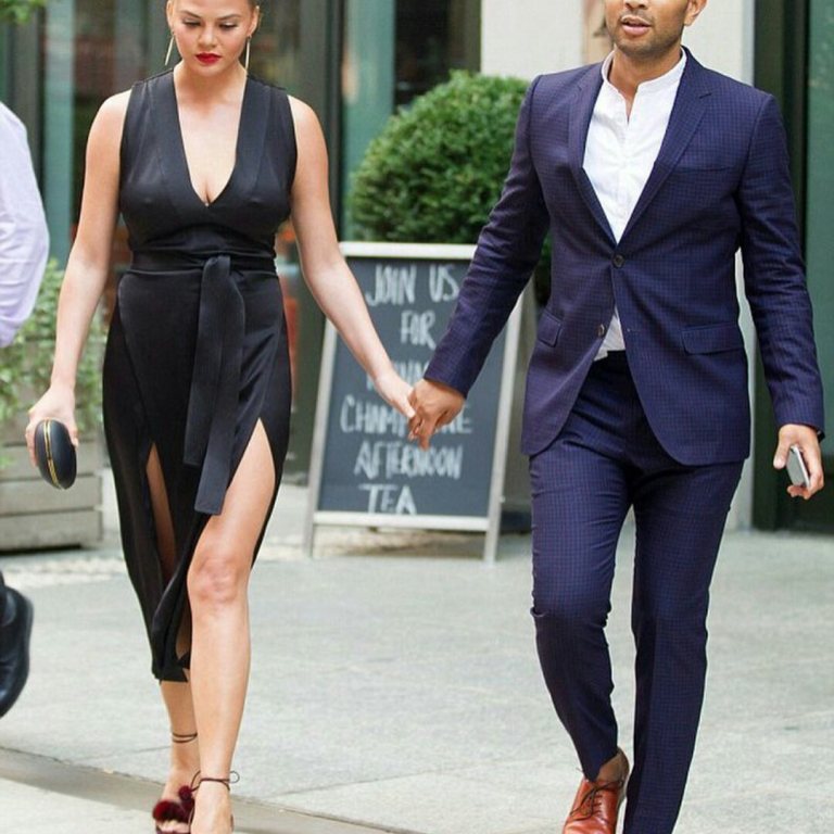 Hot! Or Hmm…: Chrissy Teigen’s Aquazzura ‘Wild Russian’ Mink Fur-Trimmed Pom Pom Sandals in Prune