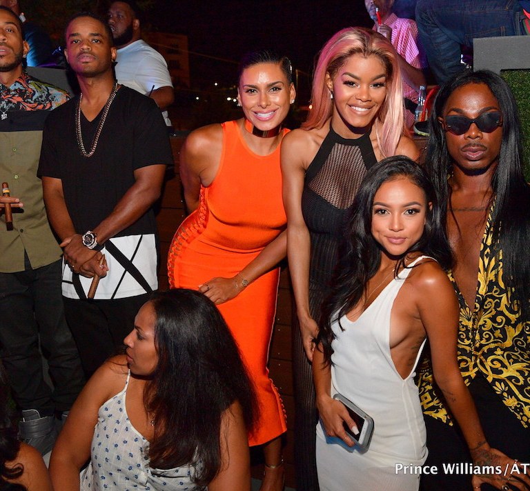 Ludaday Weekend Style: Ludacris in Versace’s Contrast Floral Print Olive Green Shirt, Laura Govan in House of CB’s Martinique Orange Side Weave Bandage Dress, Karrueche Tran’s Nasty Gal White Sheer Mini Dress, and More!