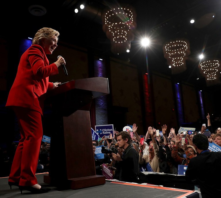 Hillary Clinton’s Red Suit: Can A Woman In Politics Be Judged by Her Wisdom and Not Her Wardrobe?