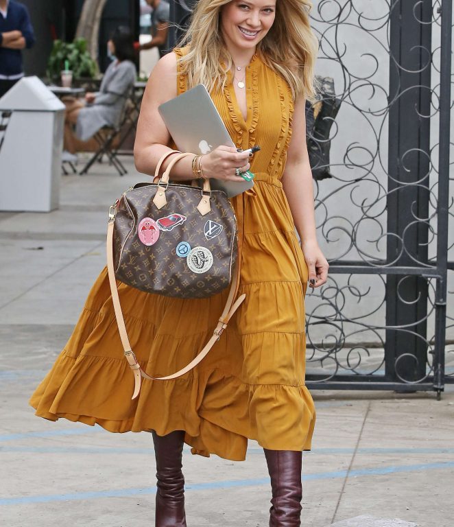 Splurge: Hilary Duff’s 901 Hair Salon $600 Ulla Johnson Marigold Minetta Silk Dress and $1,700 Louis Vuitton World Tour Speedy Bandouliere 30 Bag