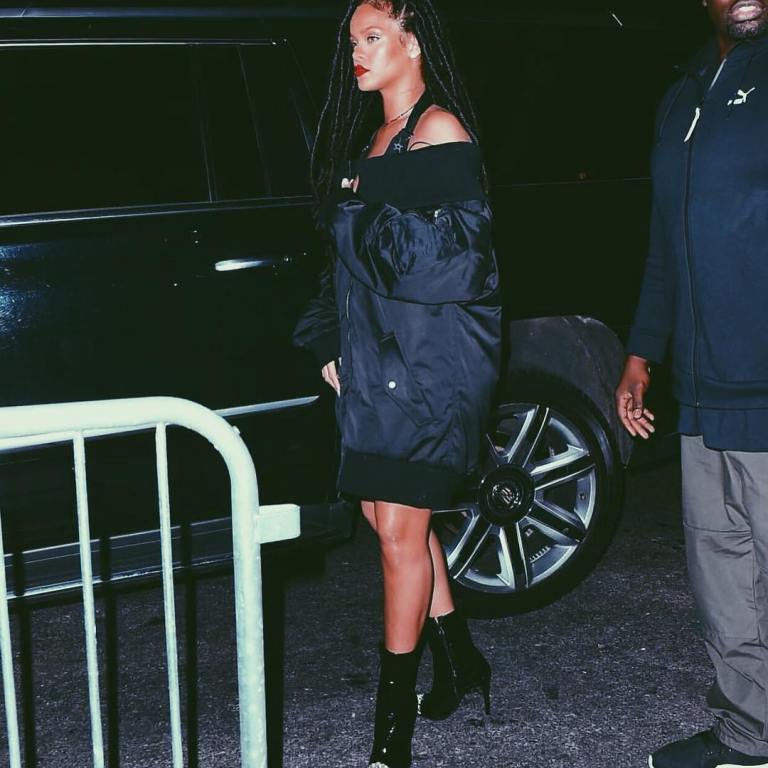 Splurge: Rihanna’s New York City $1,220 FENTY x PUMA Black Off the Shoulder Bomber and $945 Haider Ackermann Black and White Contrast Toe Ankle Boots