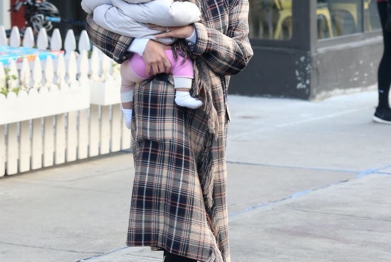 Splurge: Chrissy Teigen’s New York City $2,595 Chloé Fringed Wool and Cotton Blend Plaid Coat and $1,795 Jimmy Choo Black Suede Toni Boots