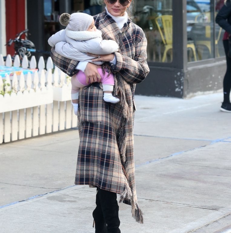 Splurge: Chrissy Teigen’s New York City $2,595 Chloé Fringed Wool and Cotton Blend Plaid Coat and $1,795 Jimmy Choo Black Suede Toni Boots