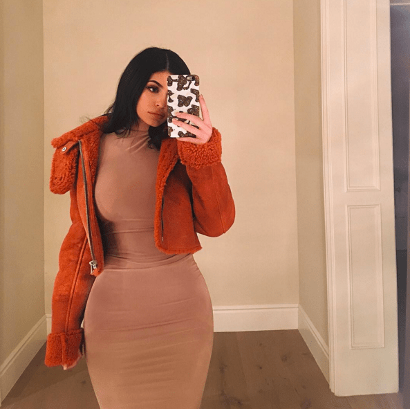 Splurge: Kylie Jenner’s Instagram $1,150 Yeezy Orange Shearling Cropped Flight Coat