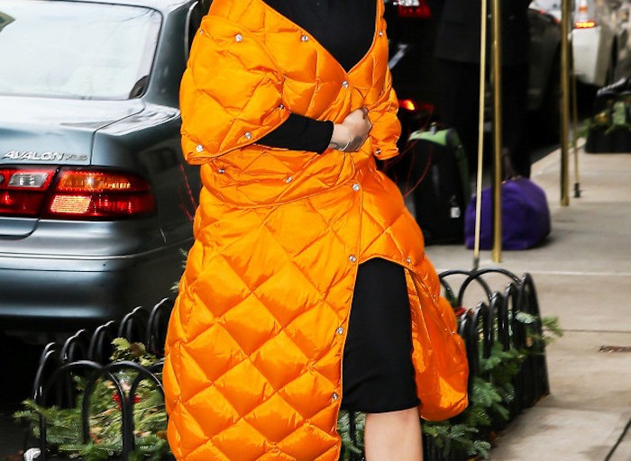 Get The Look: Rita Ora’s New York City James Perse Black Turtleneck Side Slit Dress and Acne Studios Baltimore Orange Quilted Down Coat