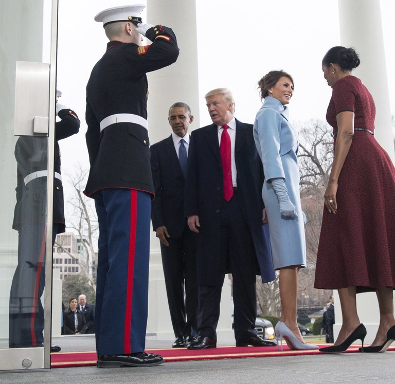 First Lady Michelle Obama Wears Red Jason Wu Dress and Melania Trump Wears Baby Blue Ralph Lauren at the Inauguration of Donald Trump