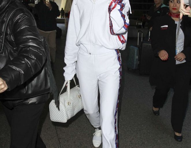 Splurge: Kendall Jenner’s LAX $990 Vetements x Champion White Edition Hoodie, $760 Track Pants, and $695 Balenciaga Race Runner Sneakers