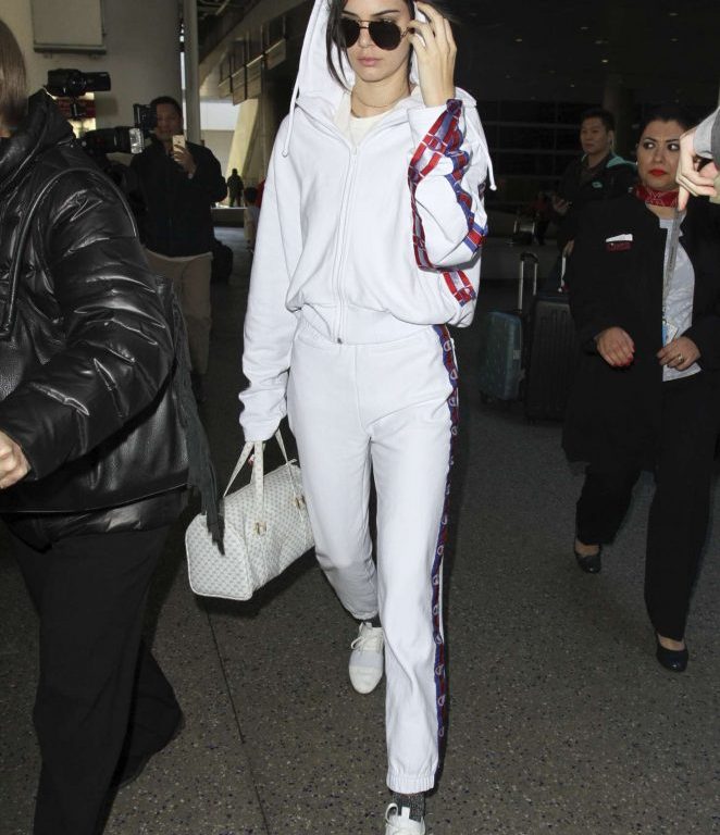 Splurge: Kendall Jenner’s LAX $990 Vetements x Champion White Edition Hoodie, $760 Track Pants, and $695 Balenciaga Race Runner Sneakers