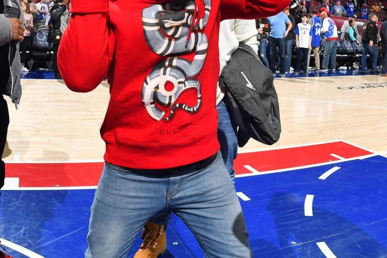 Men’s Fashion Flash: Kevin Hart’s Rockets vs Sixers Game Gucci Snake Graphic Hoodie and Gucci Ace Low-Top Sneakers