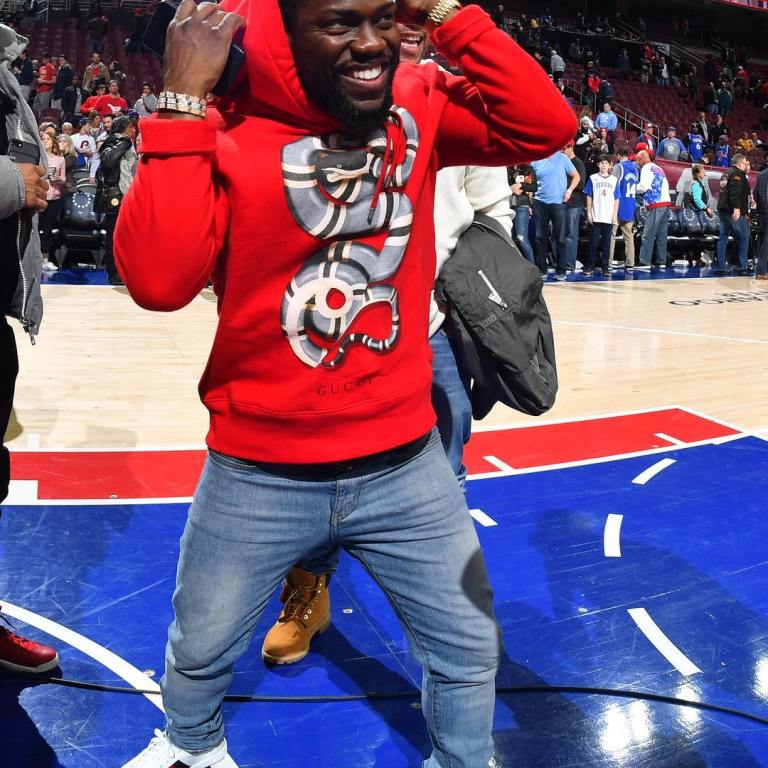 Men’s Fashion Flash: Kevin Hart’s Rockets vs Sixers Game Gucci Snake Graphic Hoodie and Gucci Ace Low-Top Sneakers