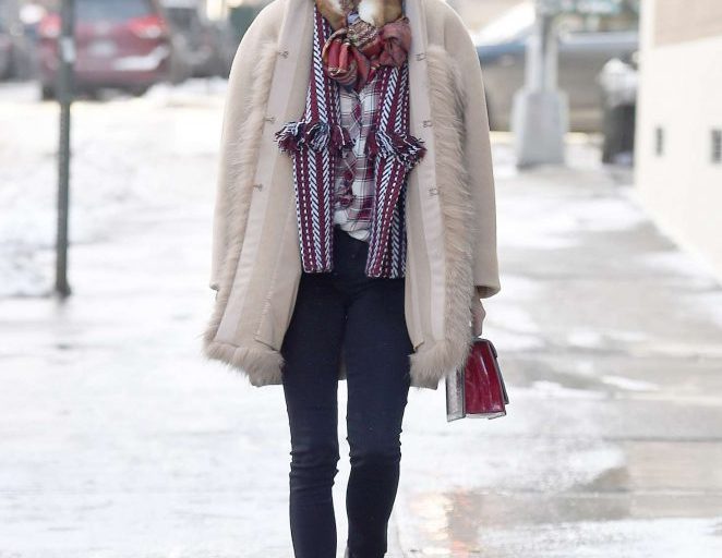 Splurge: Olivia Palermo’s New York City $1,328 Burberry Fringed Herringbone Jacquard Wool Cape and $1,195 Jimmy Choo Black Elba Boots