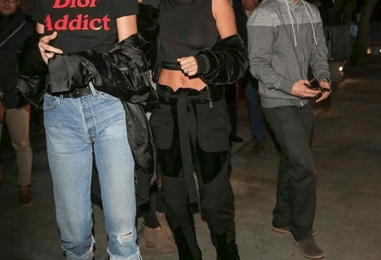 Splurge: Hailey Baldwin’s LA Lakers Game Marcelo Burlon County of Milan ‘Torrismo’ Velvet Bomber Jacket and Matching Velvet ‘Mocha’ Trousers