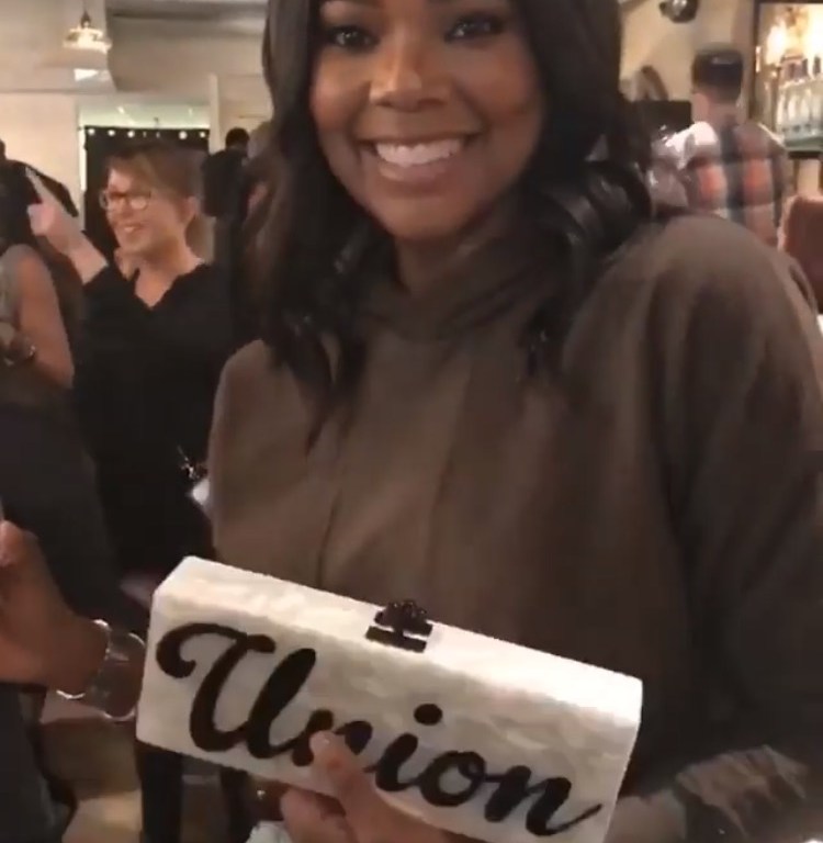 Splurge: Gabrielle Union’s Instagram Edie Parker <em> Flavia </em> Custom Union Wade Script Text Clutch