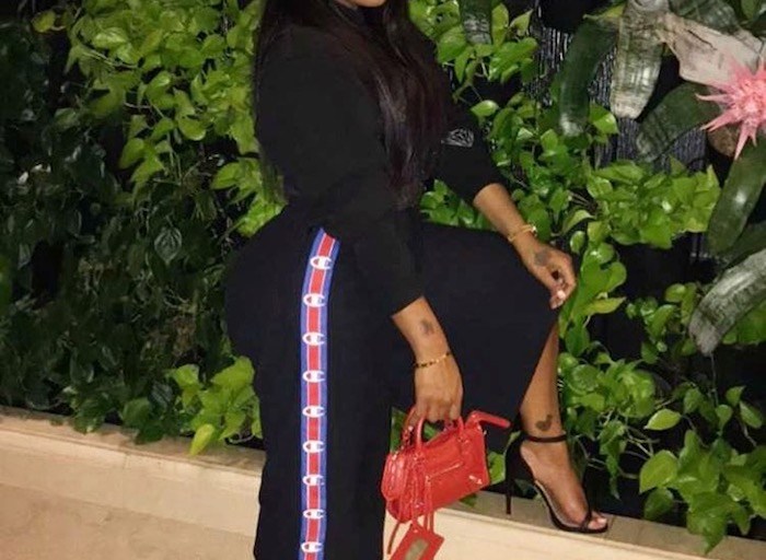 Splurge: Toya Wright’s Instagram Vetements x Champion Cotton Blend Drawstring Waistband Jersey Shorts And Balenciaga Red Classic Nano City Mini Shoulder Bag