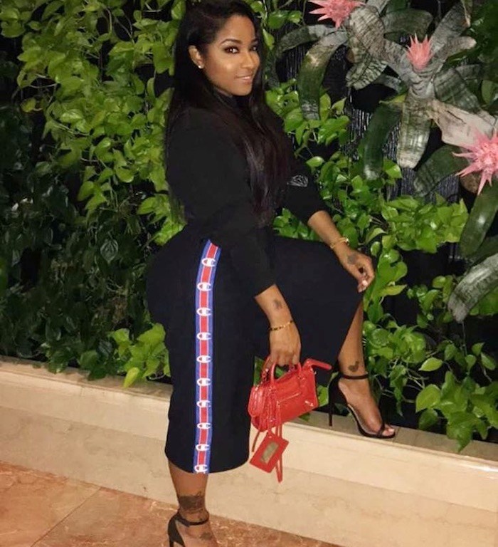 Splurge: Toya Wright’s Instagram Vetements x Champion Cotton Blend Drawstring Waistband Jersey Shorts And Balenciaga Red Classic Nano City Mini Shoulder Bag