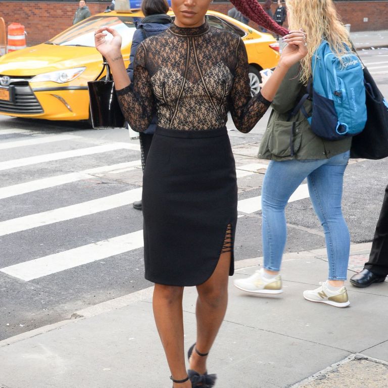 Splurge: Keke Palmer’s AOL $695 Alexander Wang Black Floral Lace Top, $595 Alexander Wang Black Lace-up Pencil Skirt, and $149 Isa Tapia Black Gigi Mesh Ruffled Pumps
