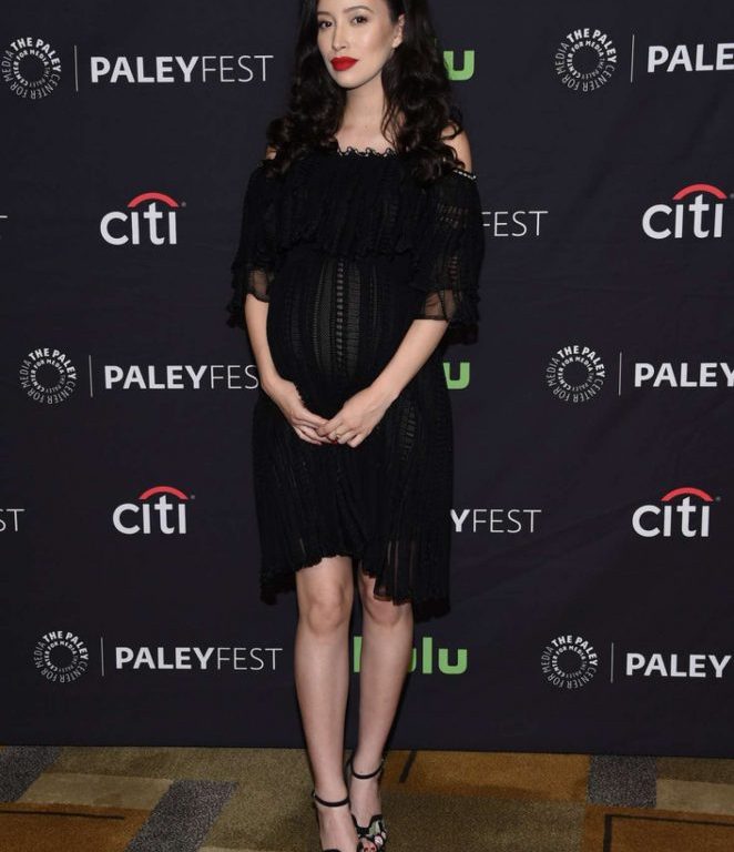 Splurge: Christian Serratos’s <em>The Walking Dead</em> Paleyfest Presentation $2,305 Alexander McQueen Black Off-the-Shoulder Ruffle Trimmed Ladder Lace Dress and $1,220 Poppy Embroidered Sandals