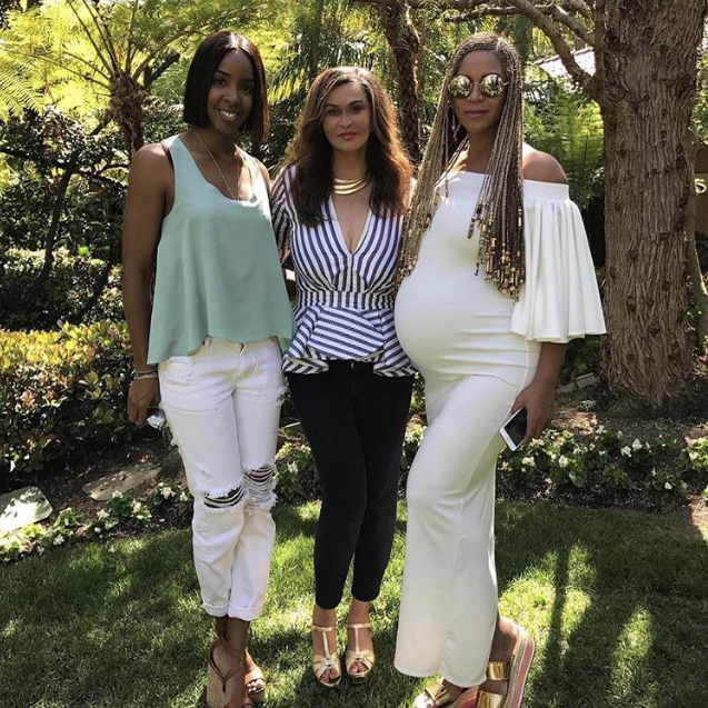 Get the Look: Beyonce’s Easter Mina Roe Off White Ruffle Sleeved Yasmin Dress and Prada Metallic Sandals + Tina Lawson’s Johanna Ortiz Ruffled St. Bart’s Top