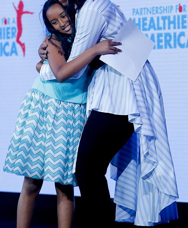 Splurge: Former First Lady Michelle Obama’s Healthier America Summit Palmer Harding Asymmetrical Shirt