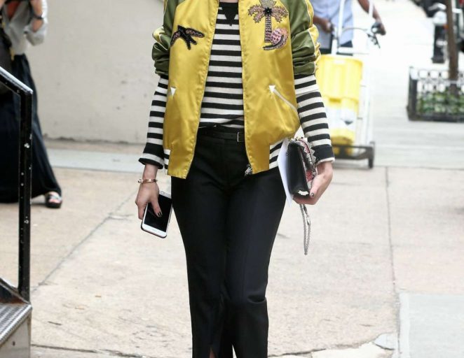 Splurge: Olivia Palermo’s Zero Bond Street Valentino $4,980 Tropical Dream Satin Bomber Jacket, $995 Black Soul Rockstud Leather Loafers, and $451 Alexis Black Mima Pants