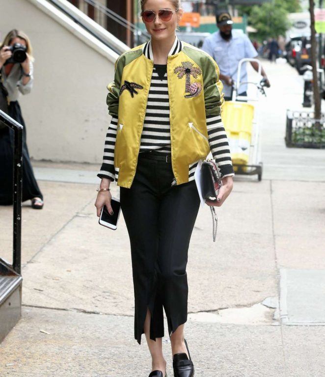 Splurge: Olivia Palermo’s Zero Bond Street Valentino $4,980 Tropical Dream Satin Bomber Jacket, $995 Black Soul Rockstud Leather Loafers, and $451 Alexis Black Mima Pants