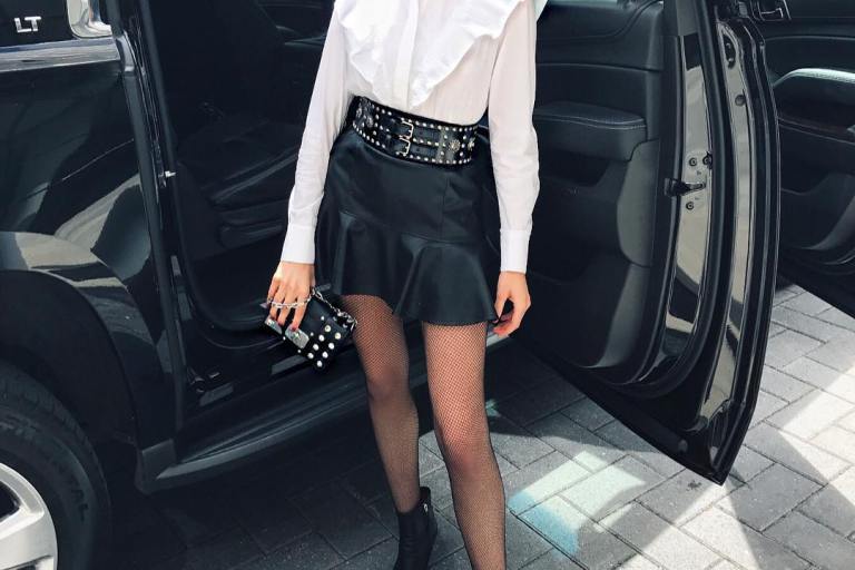 Steal: Olivia Culpo’s Instagram Olivia Culpo x Le Tote $58 White Ruffle Blouse and $48 Black Vegan Leather Flounce Skirt