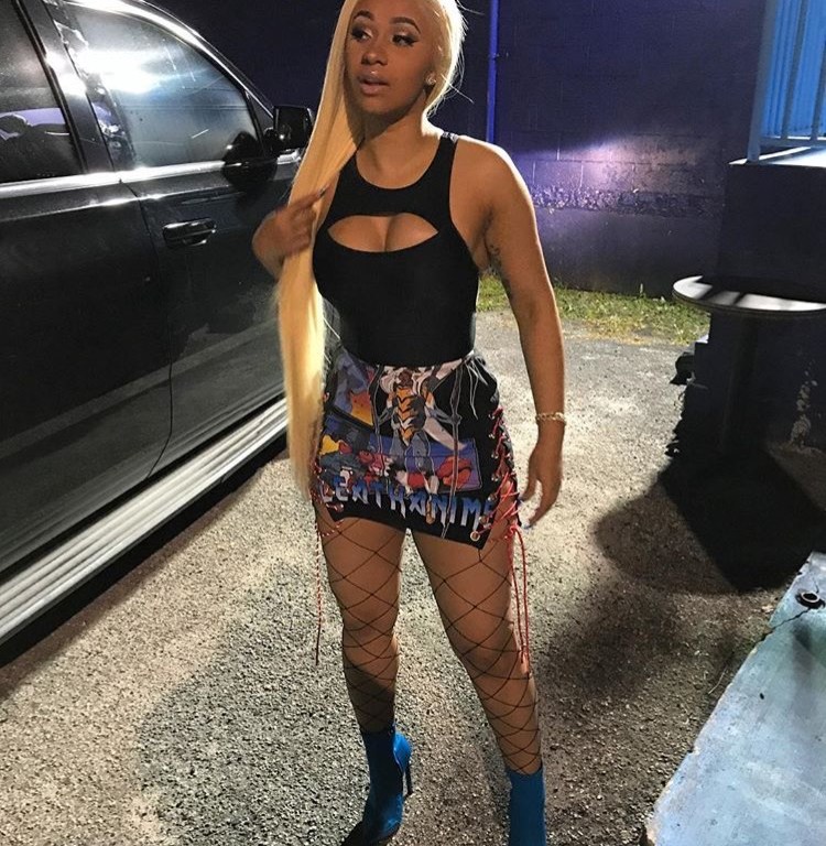 Splurge: Cardi B’s Instagram HMN ALNS Silver Grommet Paracord Lace Up Front Graphic Print Skirt