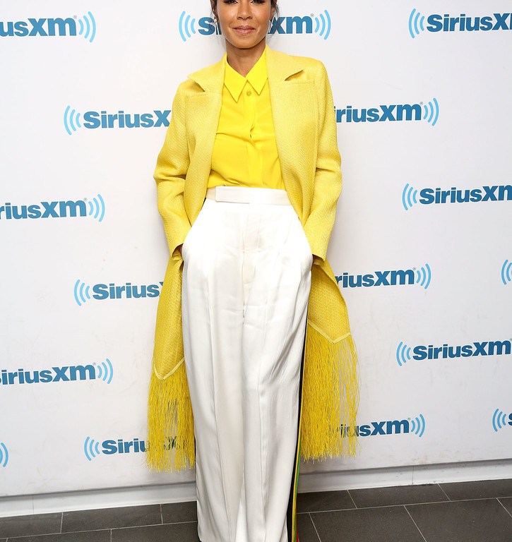 Splurge: Jada Pinkett Smith’s The Hoda Show $5,218 Maison Rabih Kayrouz Yellow Frayed Coat and $1,130 Givenchy Yellow Chiffon Shirt