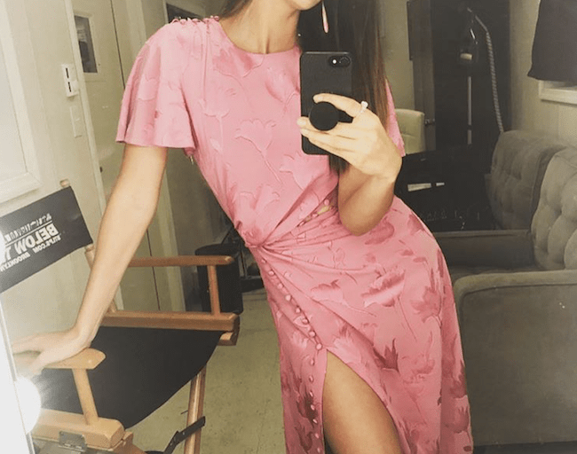 Look For Less: Lily Aldridge’s Instagram Prabal Gurung Resort 2018 Pink Tulip Cut Out Side Flutter Sleeve Midi Dress