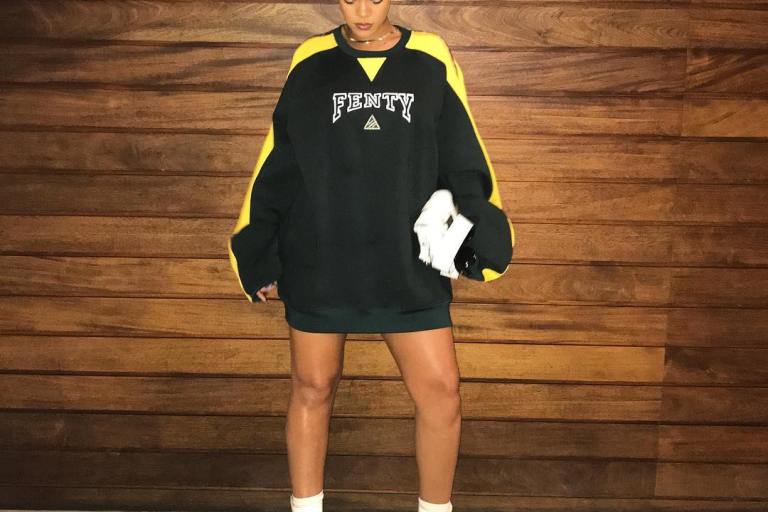 Splurge: Rihanna’s Instagram $196 FENTY x PUMA Logo Sweatshirt and $190 White Ankle Strap Sneakers, and