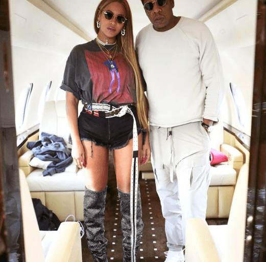 Beyonce Looks Bomb in Gucci Fall 2017 AC/DC Tee, Balenciaga Black, Red, and Purple Alek Wek Tee, and New Saint Laurent Gunmetal Crystal Boots!