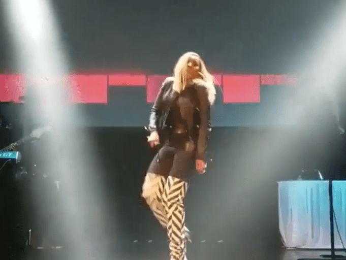 Mary J Blige Performs in Buloxi in Maria Escote Striped Black and White Boots