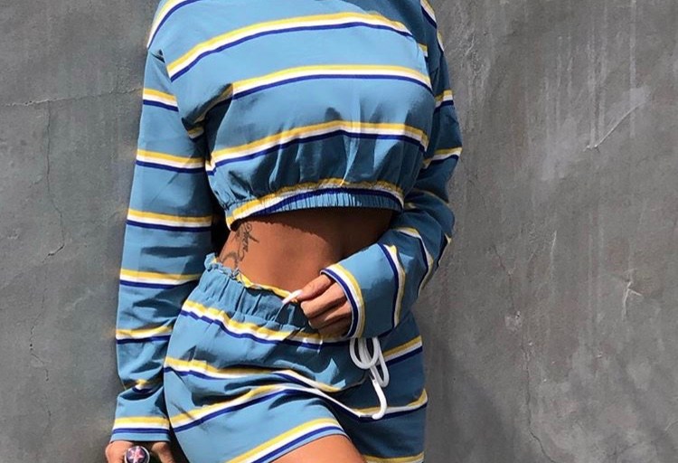 Draya Michele is a Looker in this Blue Striped Crop Top and Shorts Set from Fashion Nova