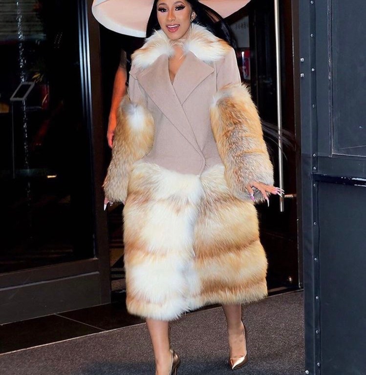 Cardi B Steps Out at Beautycon Wearing A Paco Rabanne Fur Trimmed Coat, Casadei Metallic Pumps, and a custom Sarah Sokol Millinery Hat