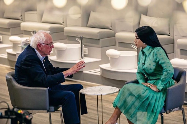 Cardi B Talks Politics With Bernie Sanders in a $5,100 Fendi Green Dress and White Christian Louboutin Heels