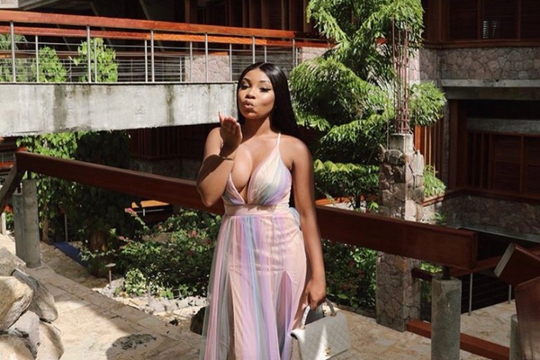 Aaliyah Jay Kept it Flirty in this Fashion Nova Maxi Dress