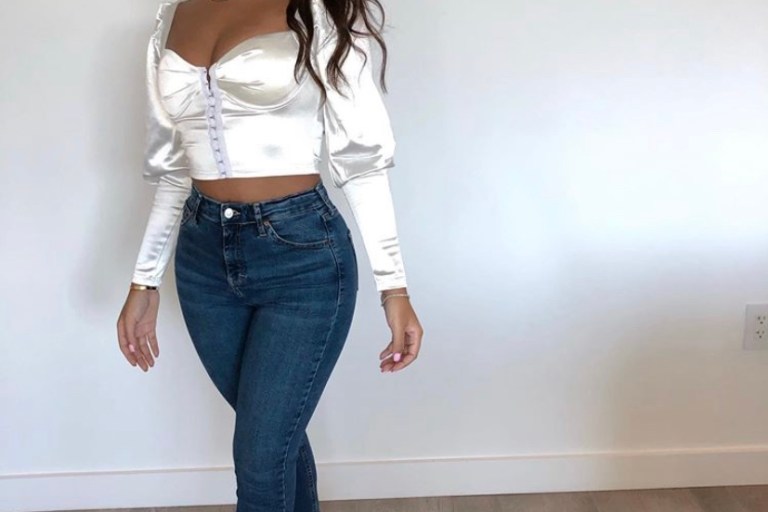 Taina Williams Kept it Flirty in this White Fashion Nova Crop Top
