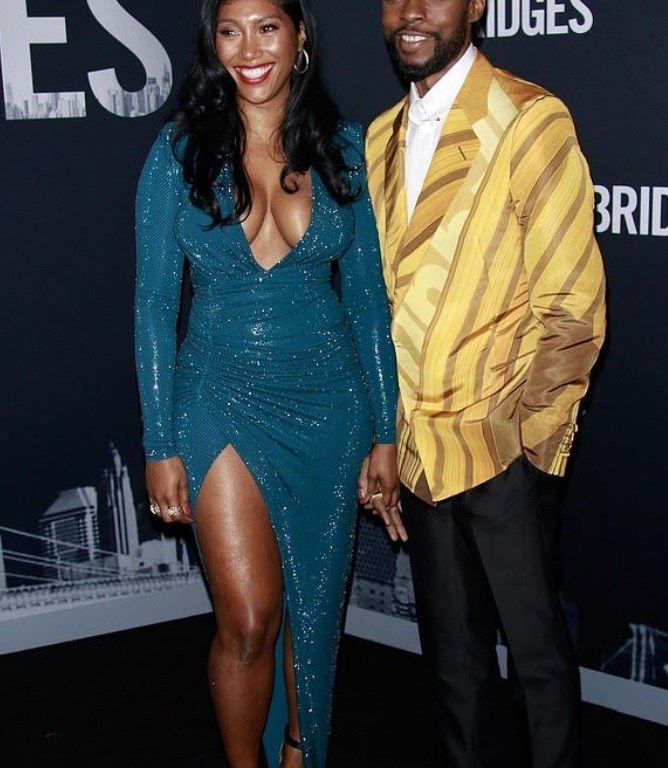 Chadwick Boseman is Dapper Posed with his Lovely Lady in an Alfred Dunhill Bright Patterned Yellow Blazer, White Couture Shirt, Black Fitted Dress Pants and  Shiny Black Shoes
