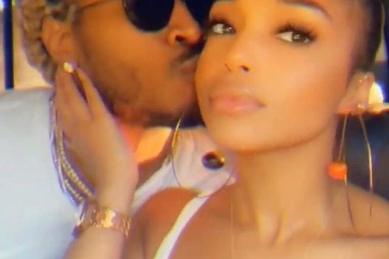 Lori Harvey Wears $100 Pair of Jaquemus Orange and Black Ball Hoop Earrings With Future In Jamaica