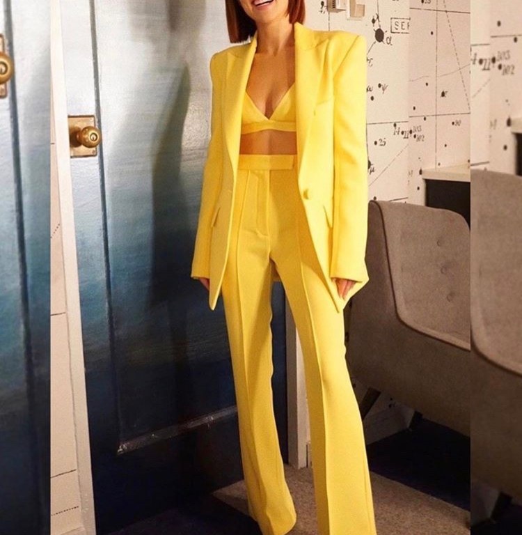 Zoey Deutch Shines Bright in a Sharp Yellow Alex Perry Boyfriend Blazer-Wide Leg Pants Suit & Matching Pointy Toe Christian Louboutin Pumps