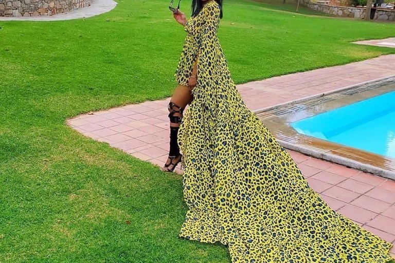 Real Housewives of Atlanta in Greece: Marlo Hampton in Sai Sankoh High Low Yellow Cheetah Dress, Tanya Sam’s Pink and Purple Printed Romper, Kandi’s Embellished Pants and More!
