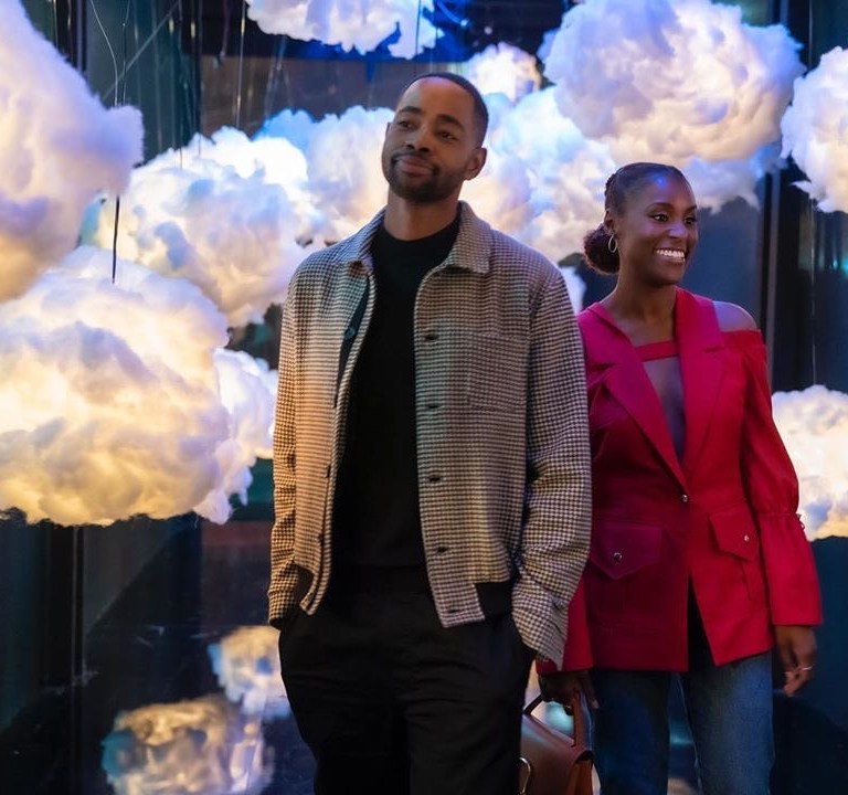 Insecure Season 4 Episode 8 Fashion Credits: Issa Rae’s Pink Red Cold Shoulder Thebe Magugu Button Blazer, Lawrence’s Checked Jacket + Molly’s Supermarket Pink Tracksuit, Found!