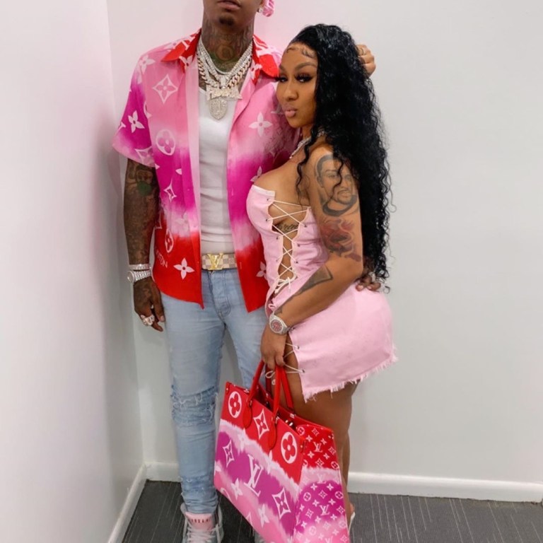 Fashion Bomb Couple: Moneybagg Yo in Custom Exclusive Game Shirt Matches Ari Fletcher in Custom Louis Vuitton Look, Louis Vuitton Bag and Louboutin Sandals