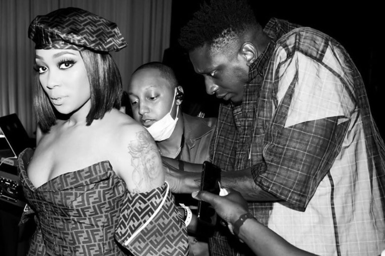 Social Media Reacts to Monica’s Verzuz Look Calling the Sir Babajagne Fendi Ensemble ‘Fake’