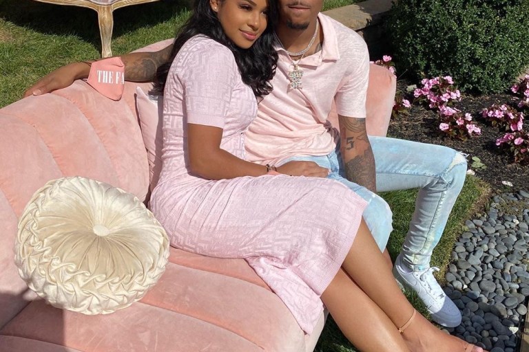 Taina Williams Posed With Beau G Herbo in $1,690 Pink Fendi Logo Dress and Tom Ford Padlock Sandals at Fabolous and Emily B’s Baby Shower!
