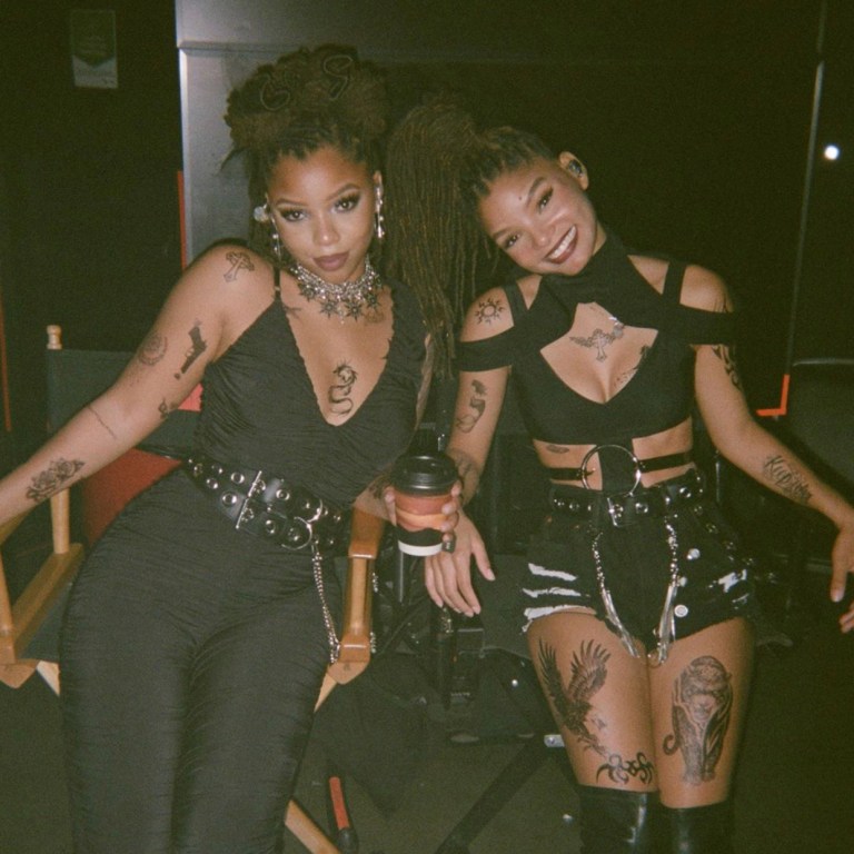 Chloe and Halle Gave Us All the Drama in All Black Looks Featuring Loreto Bodysuit and House of CB “Delilah” Black Mesh Ruched Jumpsuit