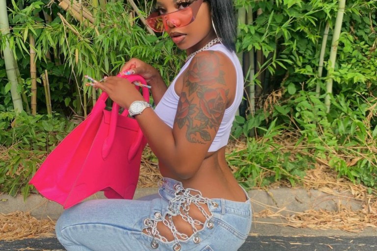 De’arra Taylor Stuns in Chain-Up Jeans From Fashion Nova