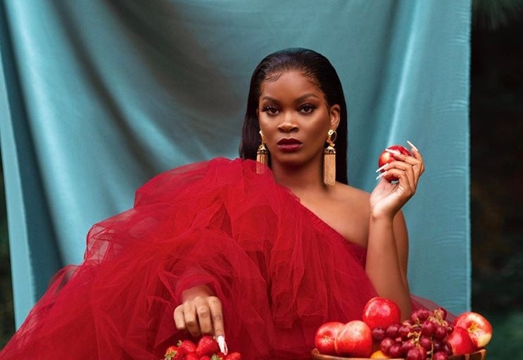 Shop the Look: Ari Lennox Looked Stunning as she Posed for her New Single “Chocolate Pomegranate” Wearing a Ruby Veronica Dress by Oyemwen
